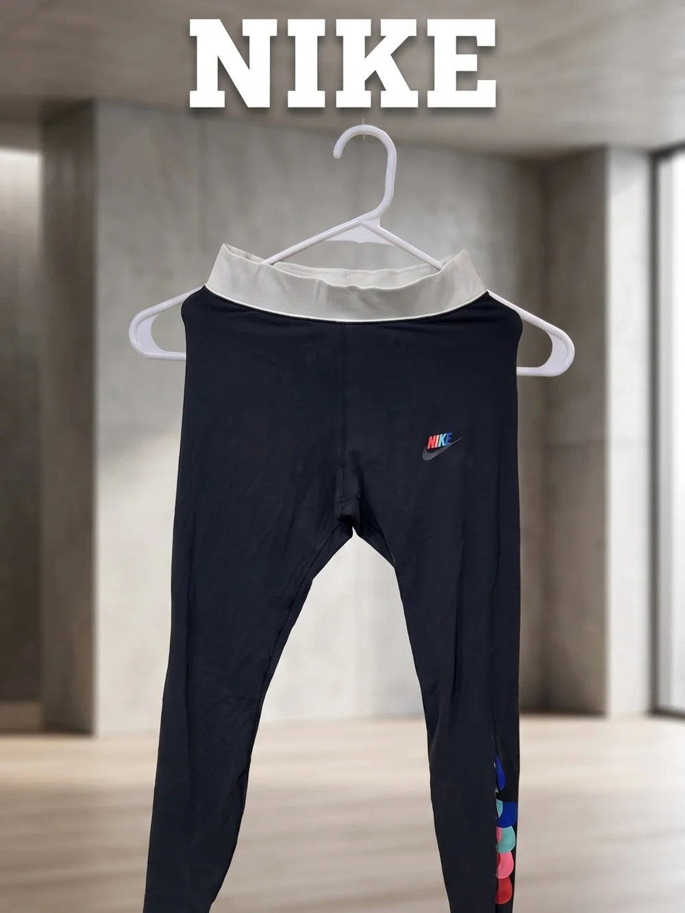 Nike Black Leggings with White Waistband and Multicolor Dot Accent
